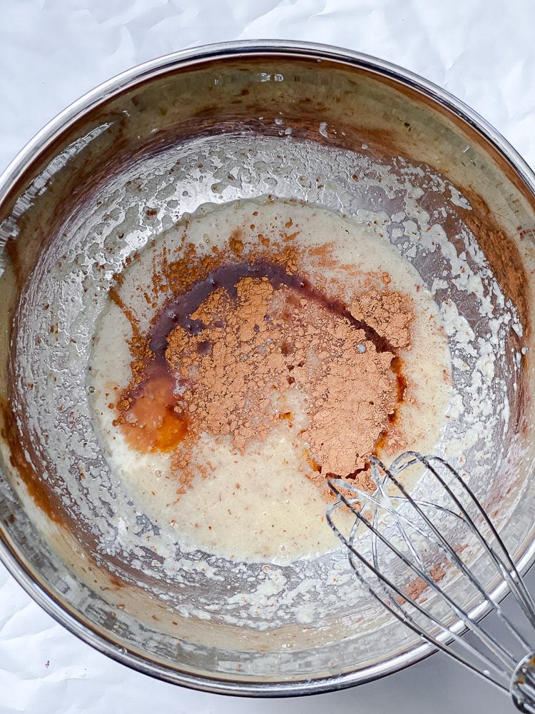 process shot of mixing ingredients in a bowl