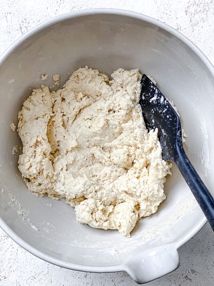 process shot of forming dough in bowl