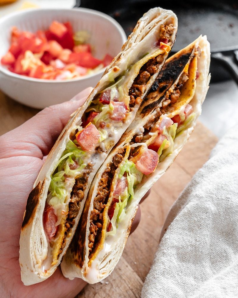 completed Homemade Vegan Crunchwrap being held