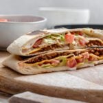 completed Homemade Vegan Crunchwrap on cutting board