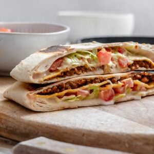 completed Homemade Vegan Crunchwrap on cutting board