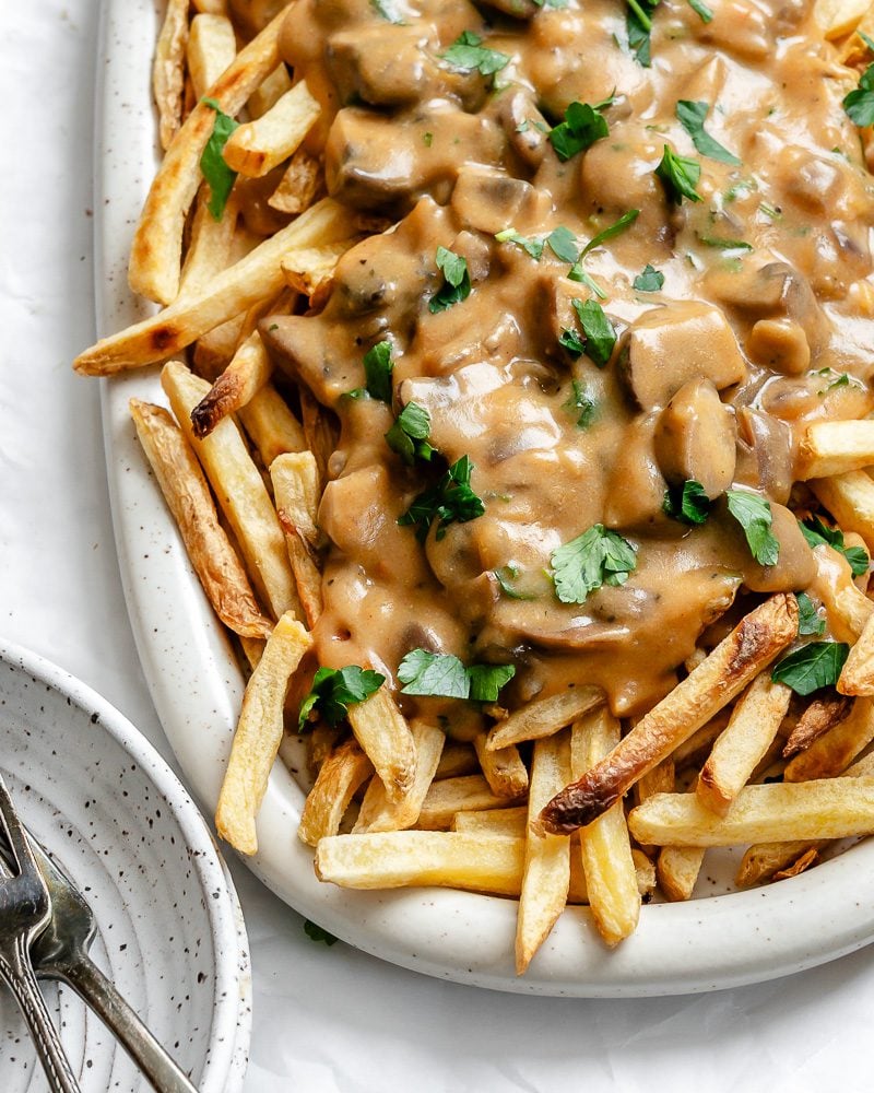 completed Vegan Poutine on a white platter