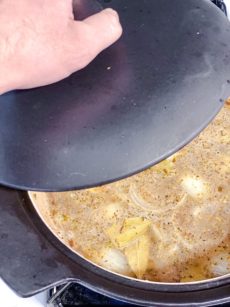 process shot showing soup cooking in pot