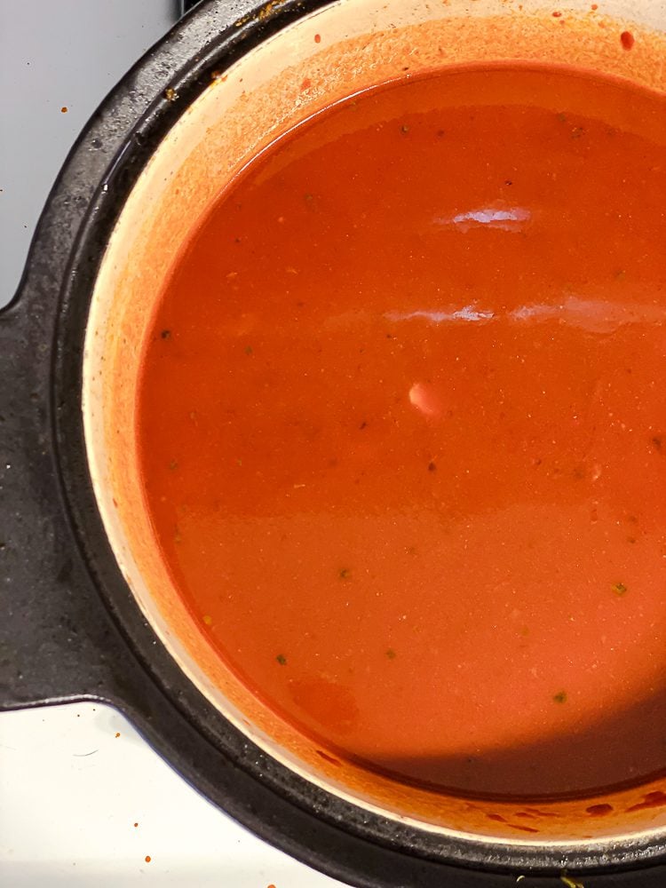 process shot of ingredients cooking in pot
