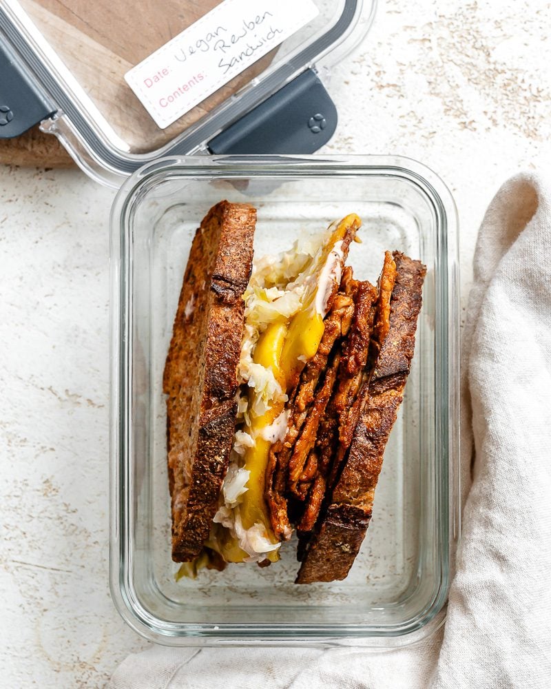 completed Vegan Reuben Sandwich in tupperware