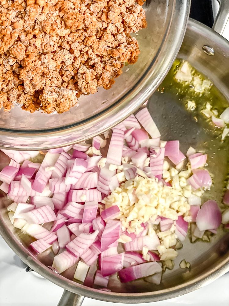 process shot showing adding soy curls to pan