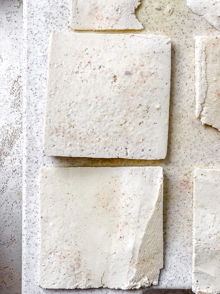 process shot showing slices of tofu on surface