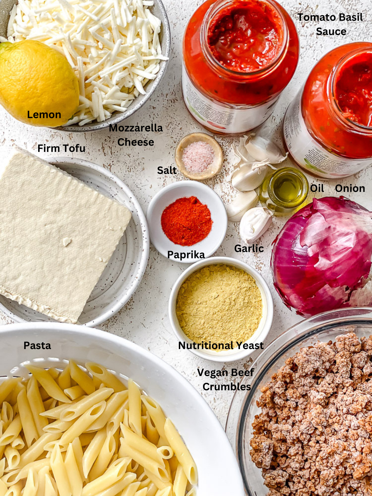 ingredients for Vegan Baked Ziti on a white surface