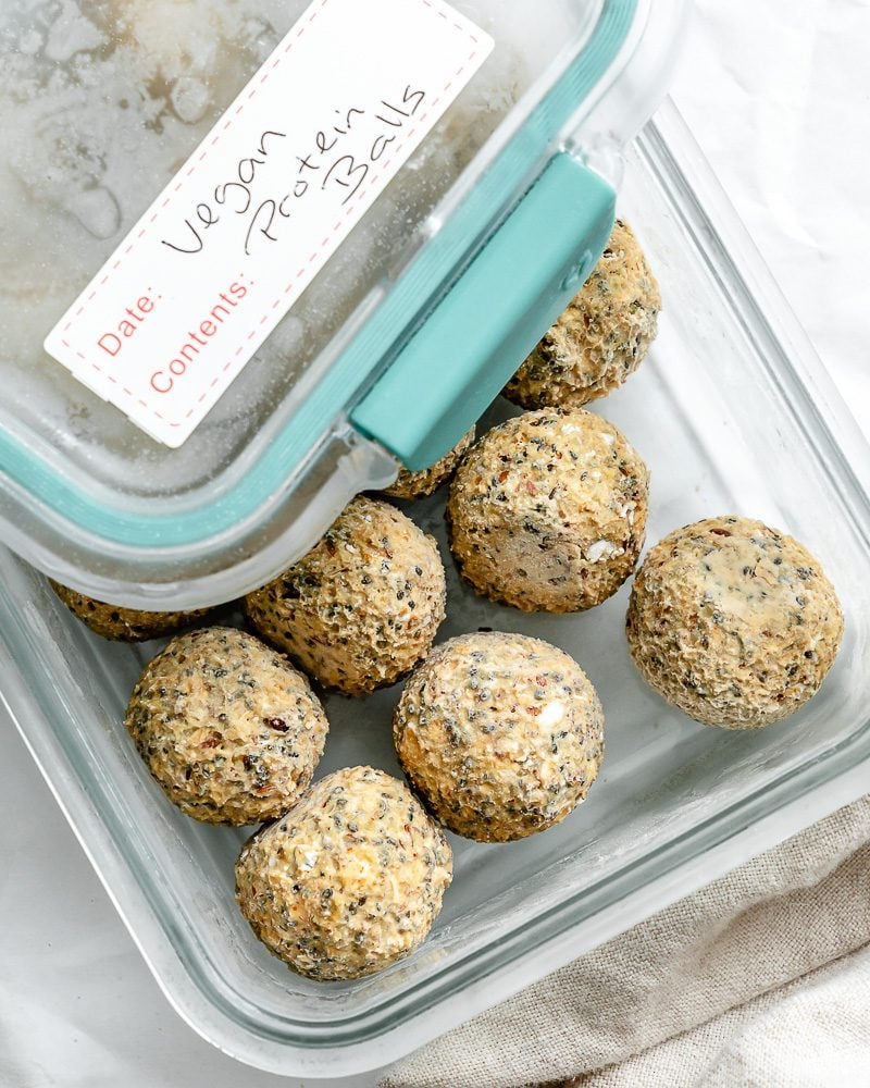 completed Peanut Butter Protein Balls with Oatmeal in storage container