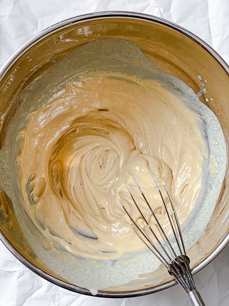 process shot of whisking ingredients in bowl