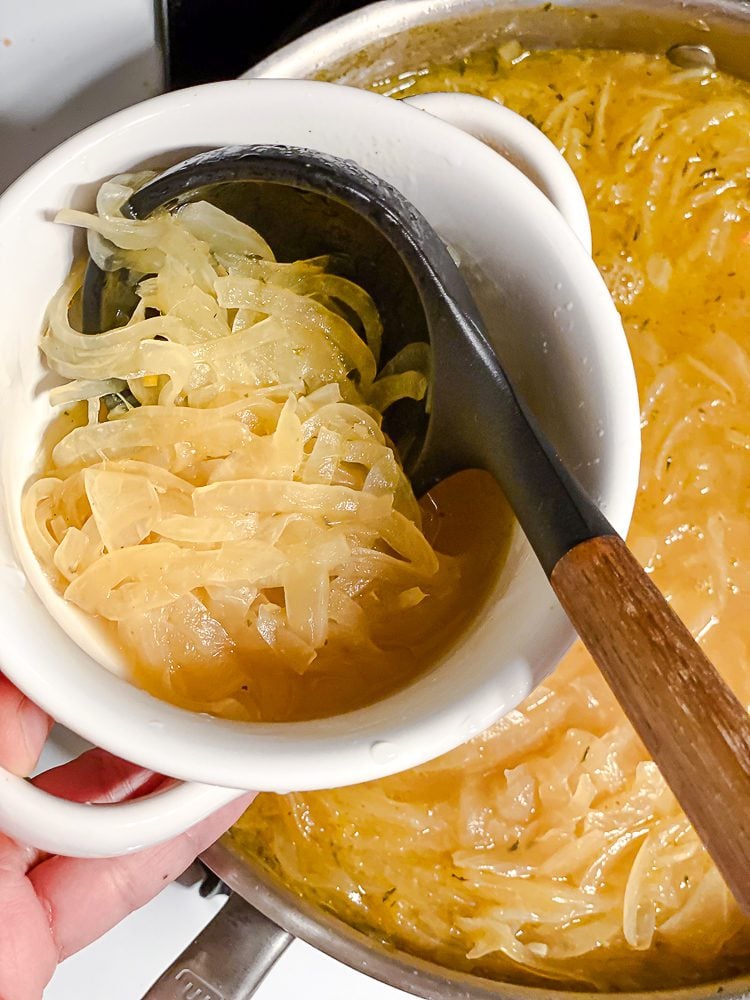 process shot showing adding soup to bowl