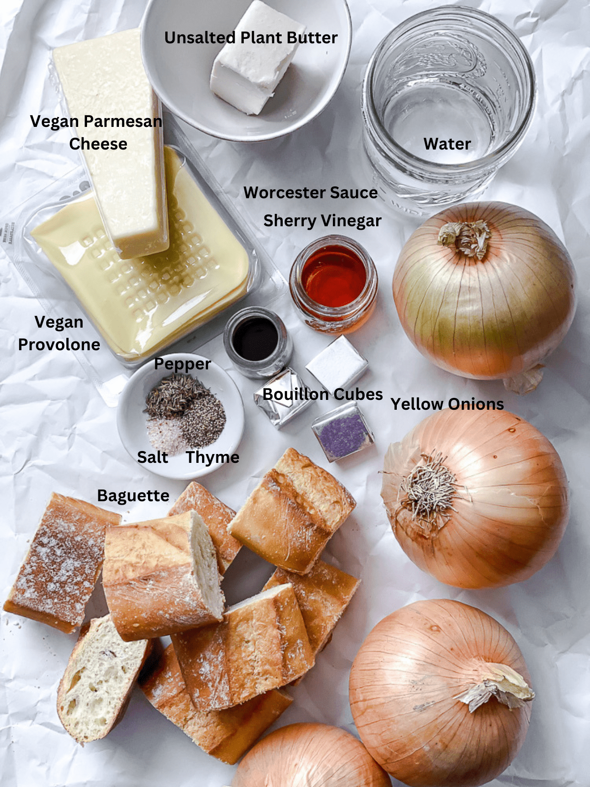 ingredients for Vegan French Onion Soup Ingredients measured out on a white surface