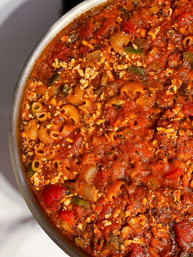 process shot of goulash cooking in pan