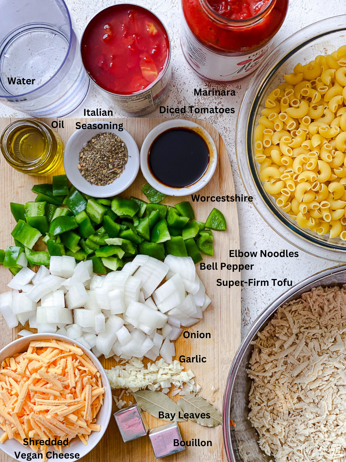 ingredients for Vegan Goulash (American) measured out on a white surface