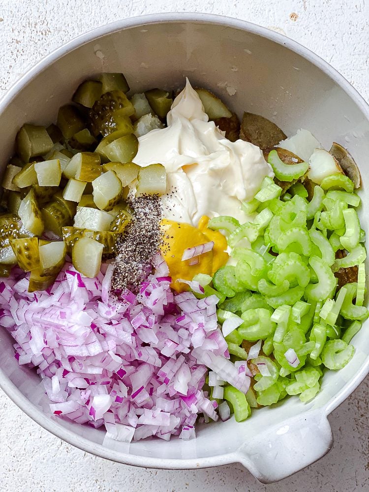 process shot showing ingredients added to bowl