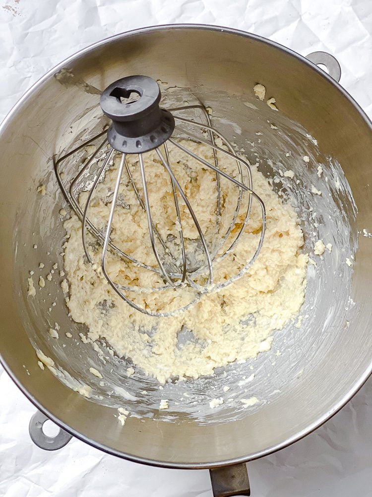 process shot showing mixing ingredients together in bowl
