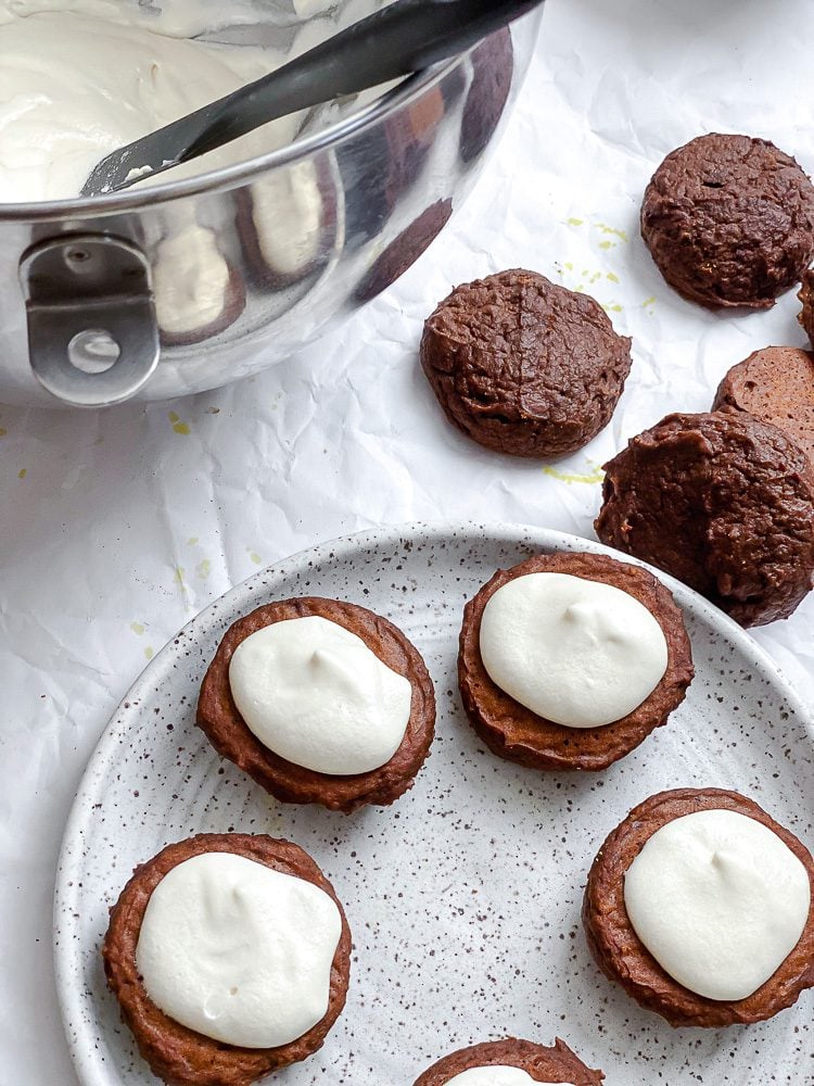 process shot showing assembling whoopie pie on a plate