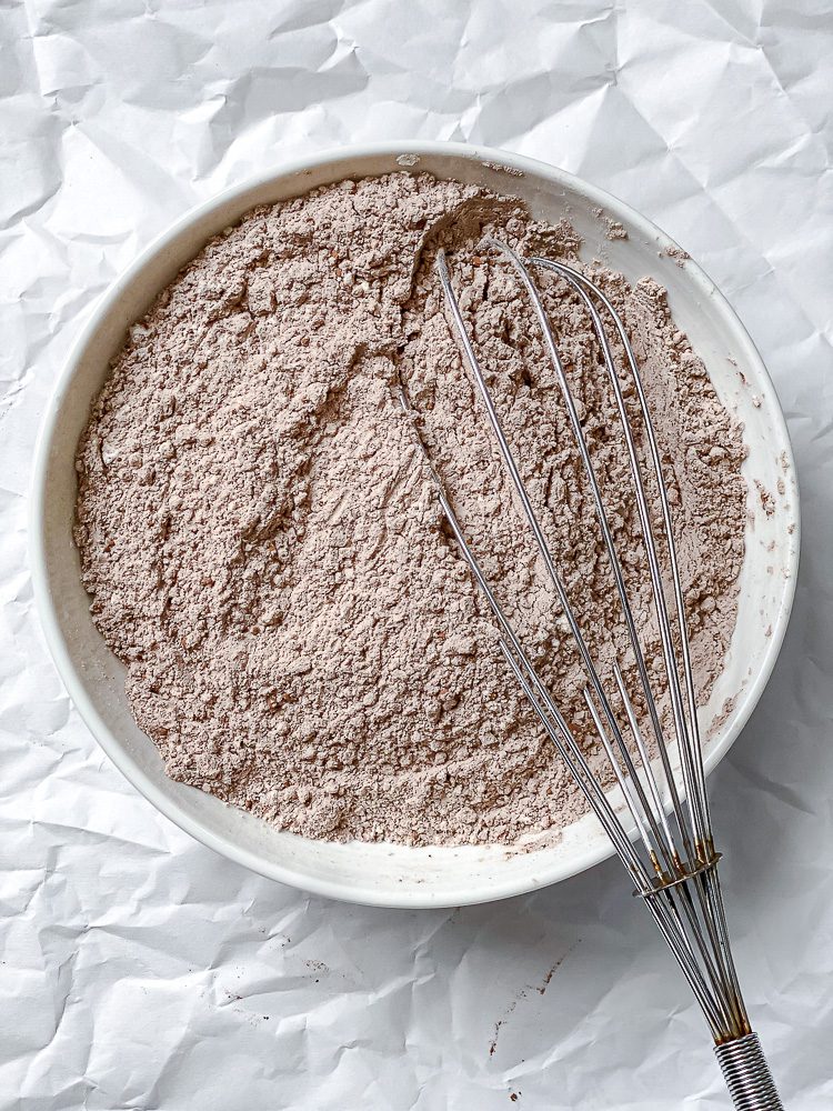 process shot showing whisking ingredients together in a bowl