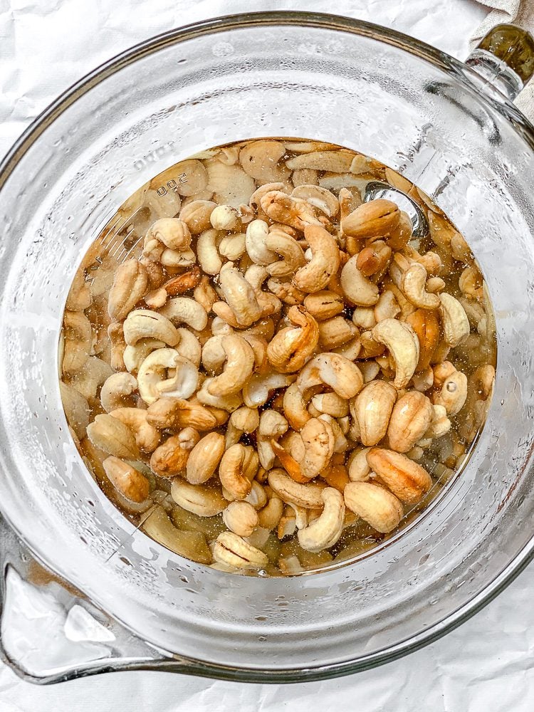process shot showing cashews being soaked in a bowl