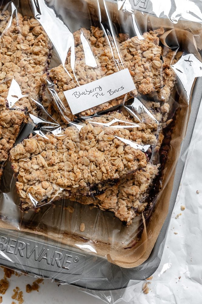 completed Easy Blueberry Pie Bars in a storage container