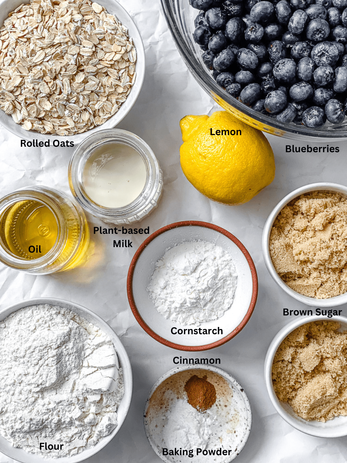 ingredients for Easy Blueberry Pie Bars measured out on a white surface