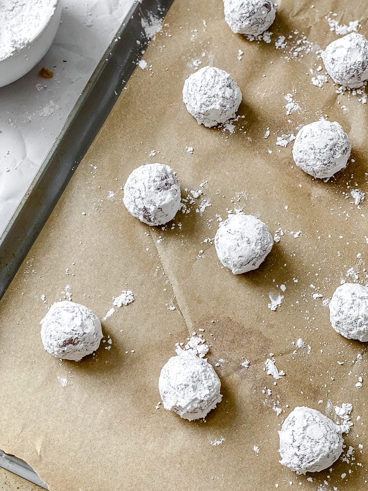 process shot showing pre-baked cookies on baking sheet
