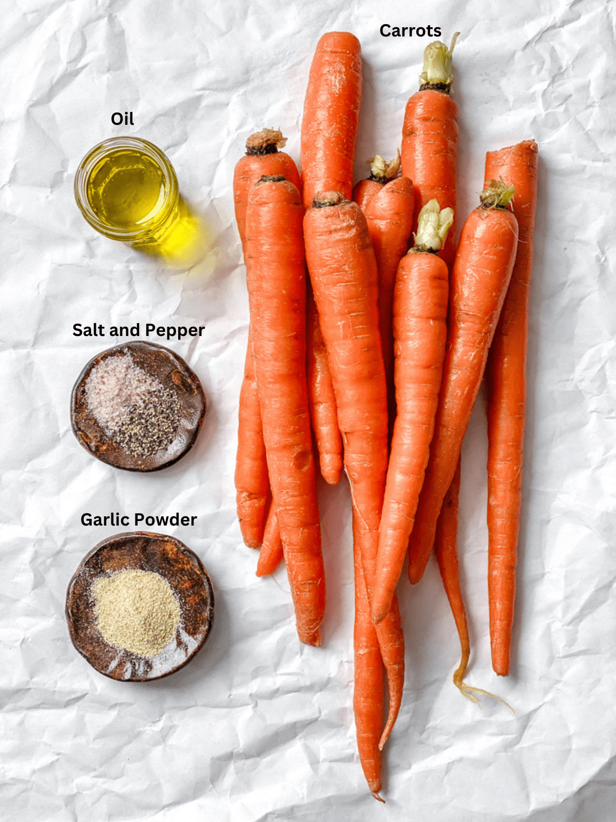 ingredients for Air Fryer Carrots measured out on a white surface