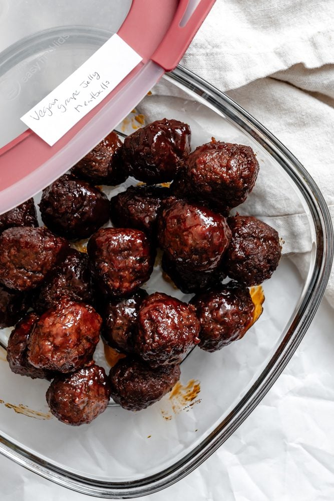 completed Chili Sauce and Grape Jelly Meatballs in a storage container