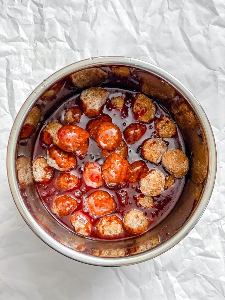process shot showing ingredients cooking in pot