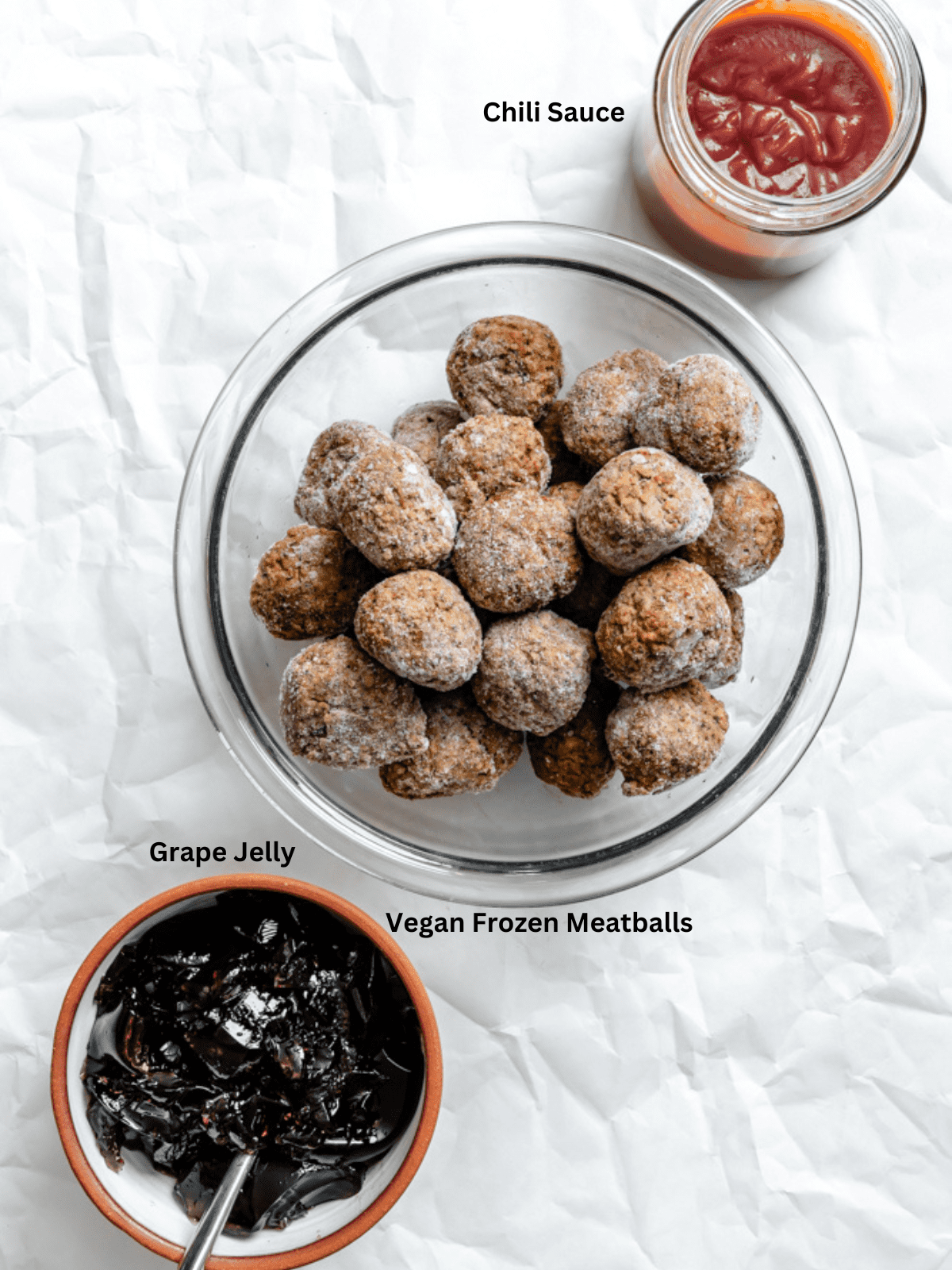 ingredients for Chili Sauce and Grape Jelly Meatballs measured out on a white surface