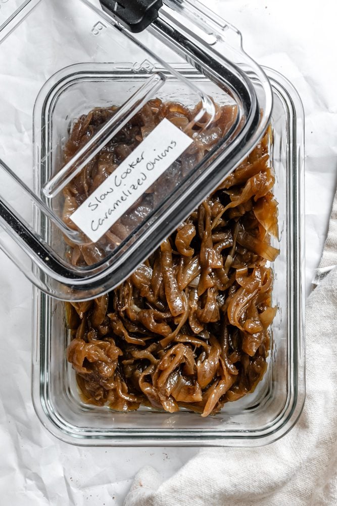 completed The BEST Slow Cooker Caramelized Onions in a storage container