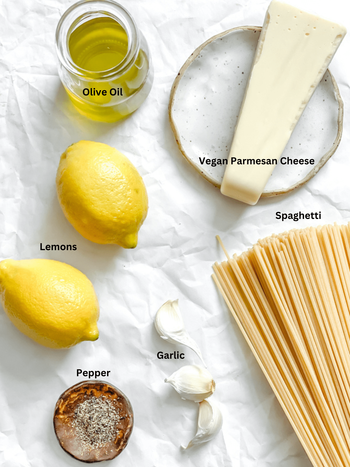 ingredients for Garlic and Lemon Pasta measured out on a white surface