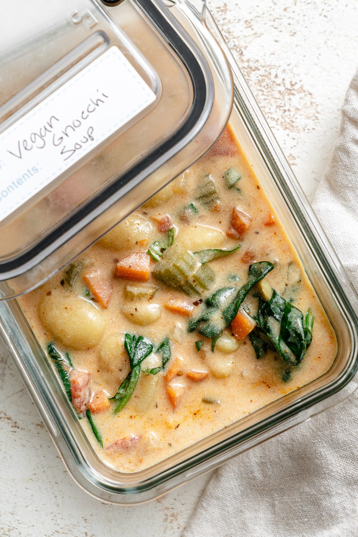 Completed Vegan Gnocchi Soup in a storage container.