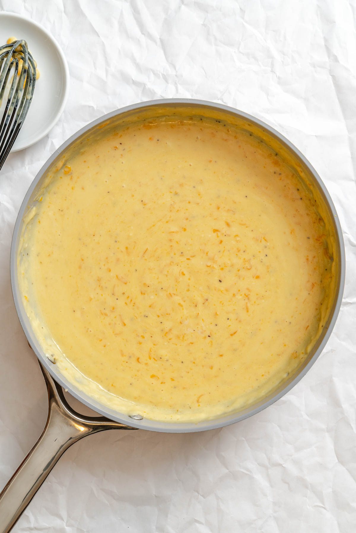 Process shot showing vegan cheese mixture in pan