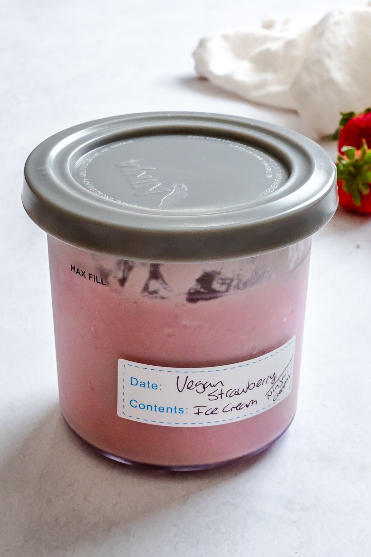 Completed Vegan Strawberry Ice Cream (Ninja Creami)-13 in a storage container.