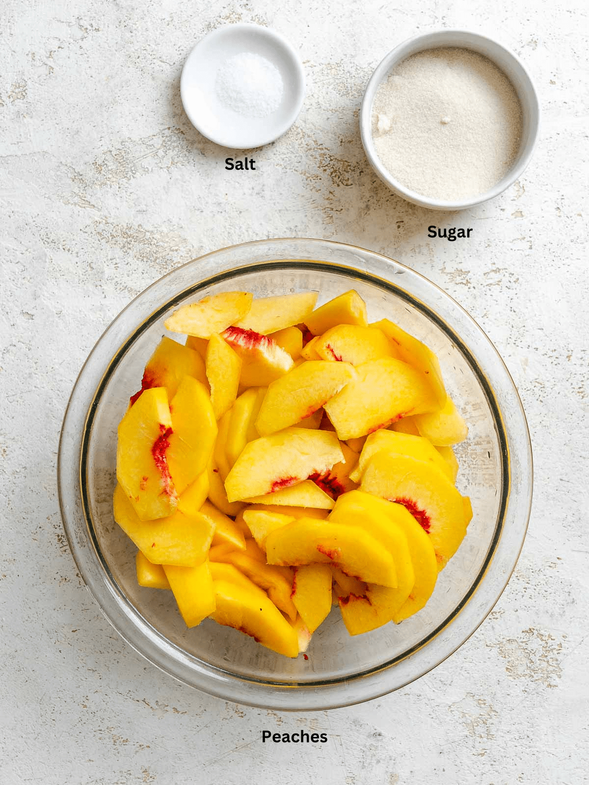 Ingredients for Ninja Creami Peach Sorbet (Fresh or Canned) measured out on a white surface.