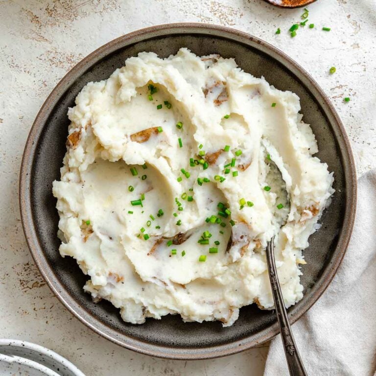 Completed vegan garlic mashed potatoes in a bowl.